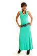 Smiling young black woman in pale green dress