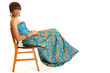 Smiling young blackwoman sitting on chair