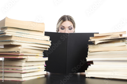Foto: young pretty girl with books young pretty girl with books