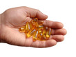 Handful of Omega-3 capsules