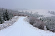 Minor road covered with heavy snow Minor road covered with heavy snow
