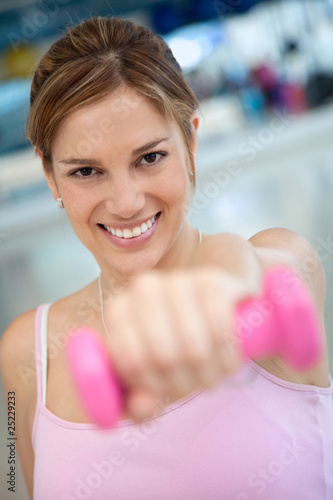 Gym woman with free-weights