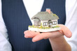 Little house in womans hand