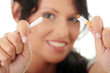 Young woman quiting smoking Young woman quiting smoking