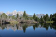 Grand Teton Mountain Range reflecting in lake Grand Teton Mountain Range reflecting in lake