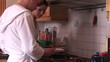 couple cooking together during breakfast