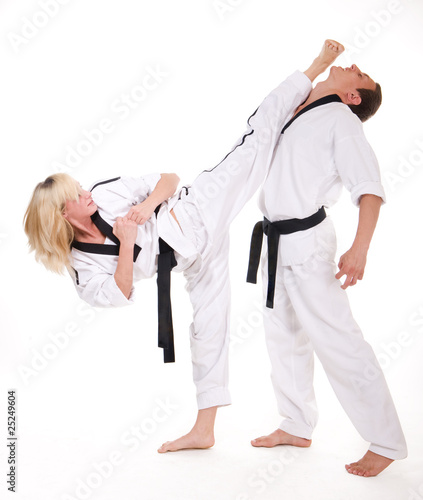 Photo: People in kimono fight on white People in kimono fight on white