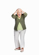 Shocked elderly woman with hands on head isolated against white