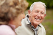 Happy mature man with a senior woman smiling