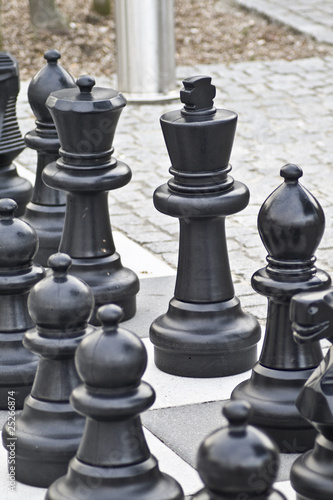 Photo: schwarze Schachfiguren schwarze Schachfiguren