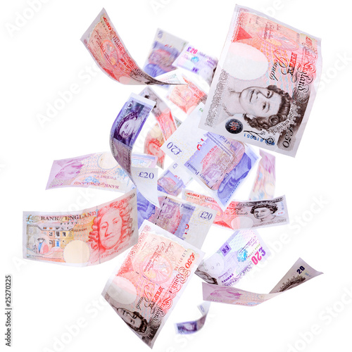 Photo: Falling Pounds on a white background Falling Pounds on a white background