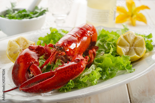 Photo: whole lobster with salad - aragosta e insalata whole lobster with salad - aragosta e insalata