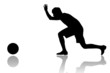A man is playing a bowling game