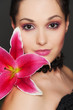 attractive woman with pink flower