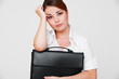 bored secretary with black briefcase bored secretary with black briefcase