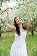 carefree young woman in park