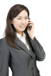 スマートフォンをかける女性社員
