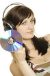 Woman listening to music. In his hand a music CD