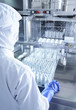 A worker working with sterile equipment
