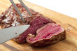 roasted meat on a cutting board. isolated object roasted meat on a cutting board. isolated object