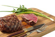 roasted meat on a cutting board. isolated object roasted meat on a cutting board. isolated object