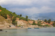 Native fishing village with boats on water Native fishing village with boats on water