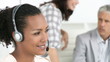 Video: afican woman with headset wwith her team afican woman with headset wwith her team