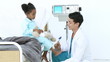 doctor checking little girl reflex
