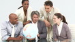Vidéo : Multi-cultural business team looking at a terrestrial globe Multi-cultural business team looking at a terrestrial globe