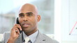 Vidéo : handsome man on phone sitting in his office handsome man on phone sitting in his office