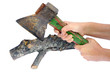 The farmer cuts with a rusty axe a log