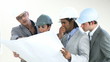 architects looking plans against white background