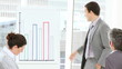 young businessman presenting graph