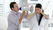 businessman  yelling through a megaphone
