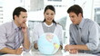 three young business people speaking about globalization