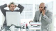 frustrated businessmen at work