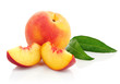 fresh peach fruits with green leaves