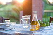 table setting with white wine and fresh figs outside