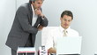 manager helping his assistant with computer