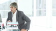 Two furious businessmen working at a computer