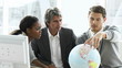 Vidéo : manager with two young executives looking at a terrestrial globe manager with two young executives looking at a terrestrial globe