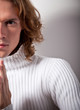 Half face. Portrait of long-haired handsome man