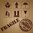 Wooden shipping box with fragile signs and stamp Wooden shipping box with fragile signs and stamp