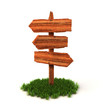 old wooden empty signpost on grass old wooden empty signpost on grass