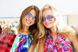 Two beautiful girls out shopping