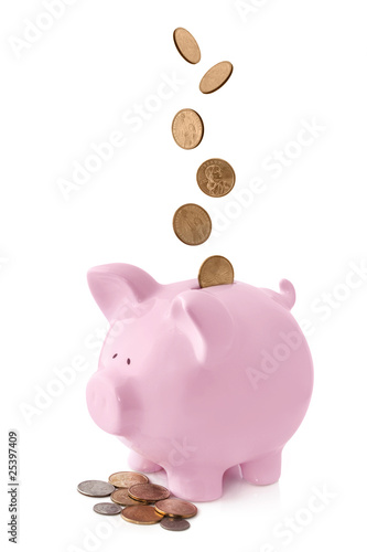 Foto: Piggy Bank with Falling Coins Piggy Bank with Falling Coins