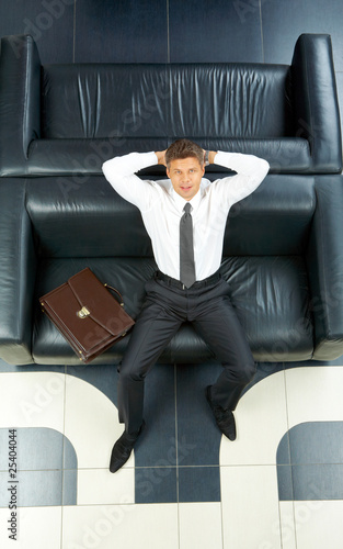Businessman on sofa