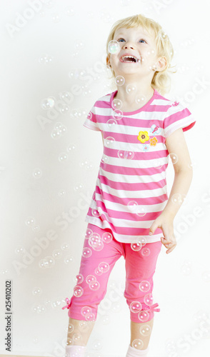 little girl with bubbles