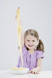 Photo: girl (4-5) eating spagetti, smiling, portrait girl (4-5) eating spagetti, smiling, portrait