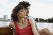 germany, berlin, young couple on motorboat, portrait